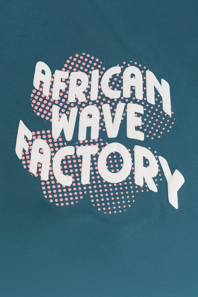 Mami Wata African Wave Factory surf tee, 100% cotton, made in Africa.