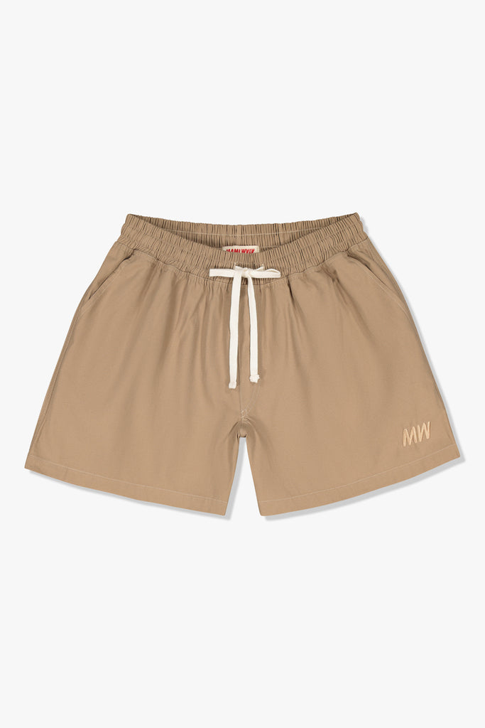 Front view of Mami Wata Off the Beach Walk Short in cotton twill with drawstring waist.